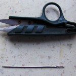 Scissors and needle
